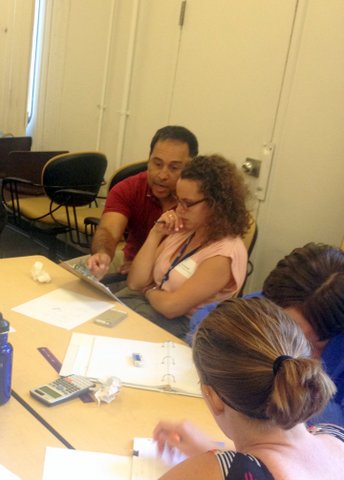 Dr. Ovie Soto, MfA SD senior associate, works with a guest teacher at the MfA SD Summer Institute’s Visitors Day, July 9.